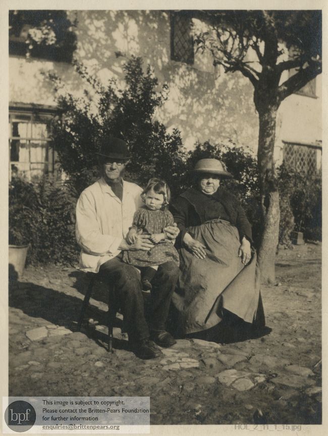 Photographs of Mr and Mrs Yeldham with grandchild