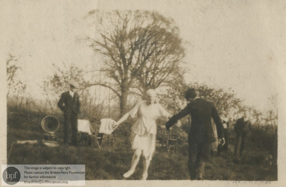 Photograph of Imogen Holst country dancing with a man