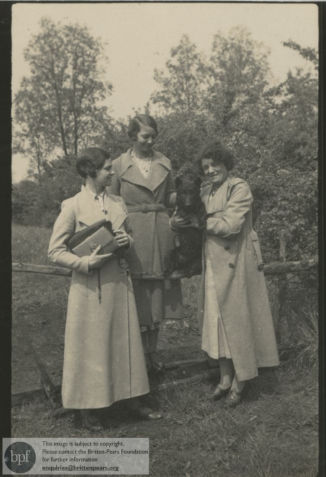 Photograph of Dorothy Callard with a dog in Thaxted, Essex