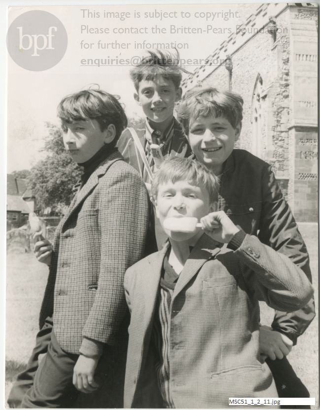 Performers from The Burning Fiery Furnace in Orford churchyard