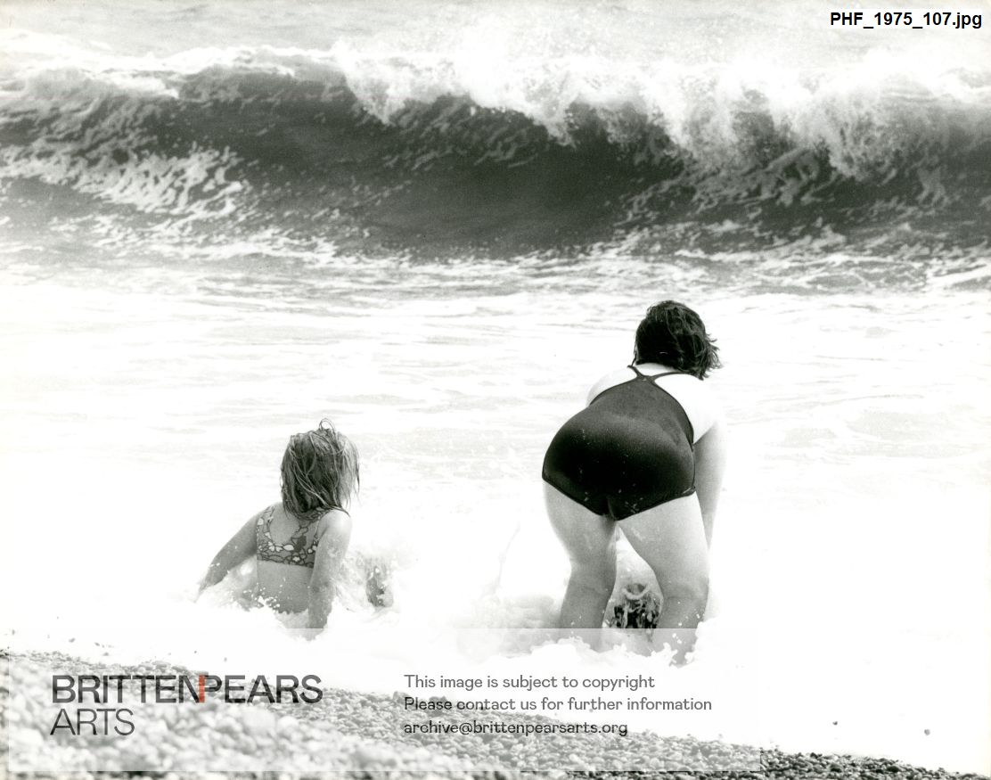 Photograph of two swimmers on Aldeburgh beach