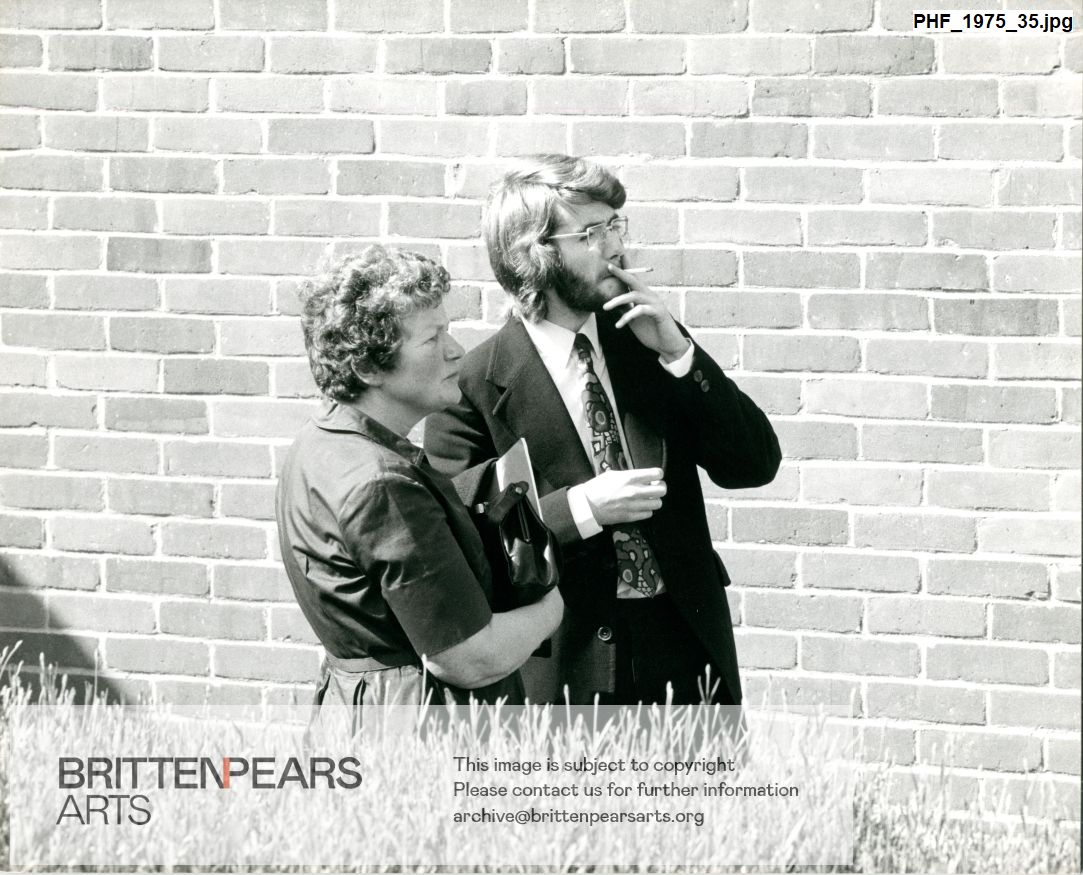 Photograph of Irene Secombe and James Ellis outside Snape Maltiings Concert Hall