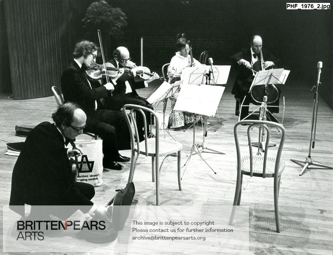 Photograph of Gabrieli String Quartet on the stage at Snape Maltings Concert Hall
