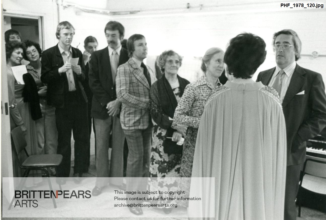 Photograph of Janet Baker and people queueing for her autograph