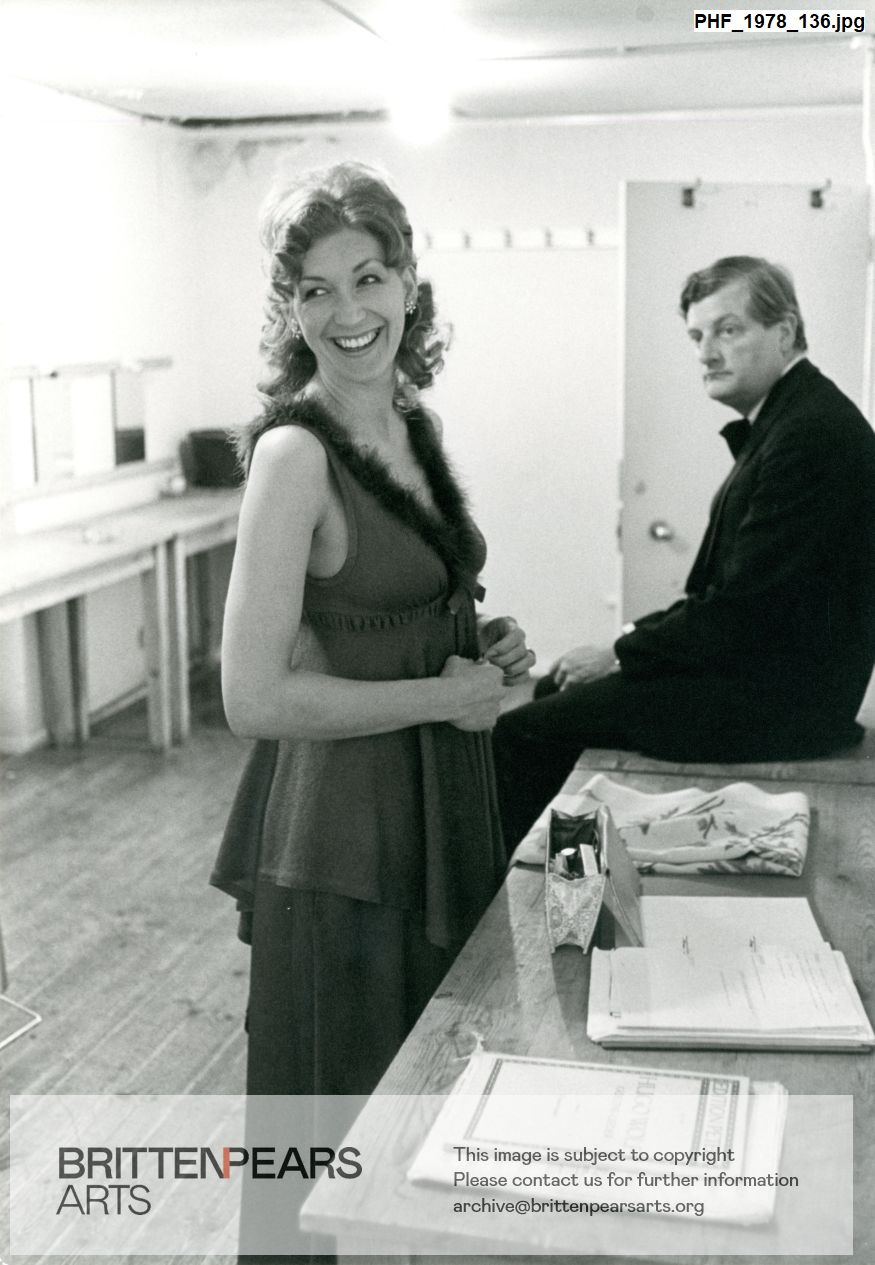 Photograph of Felicity Lott with unidentified man in dressing room at Jubilee Hall