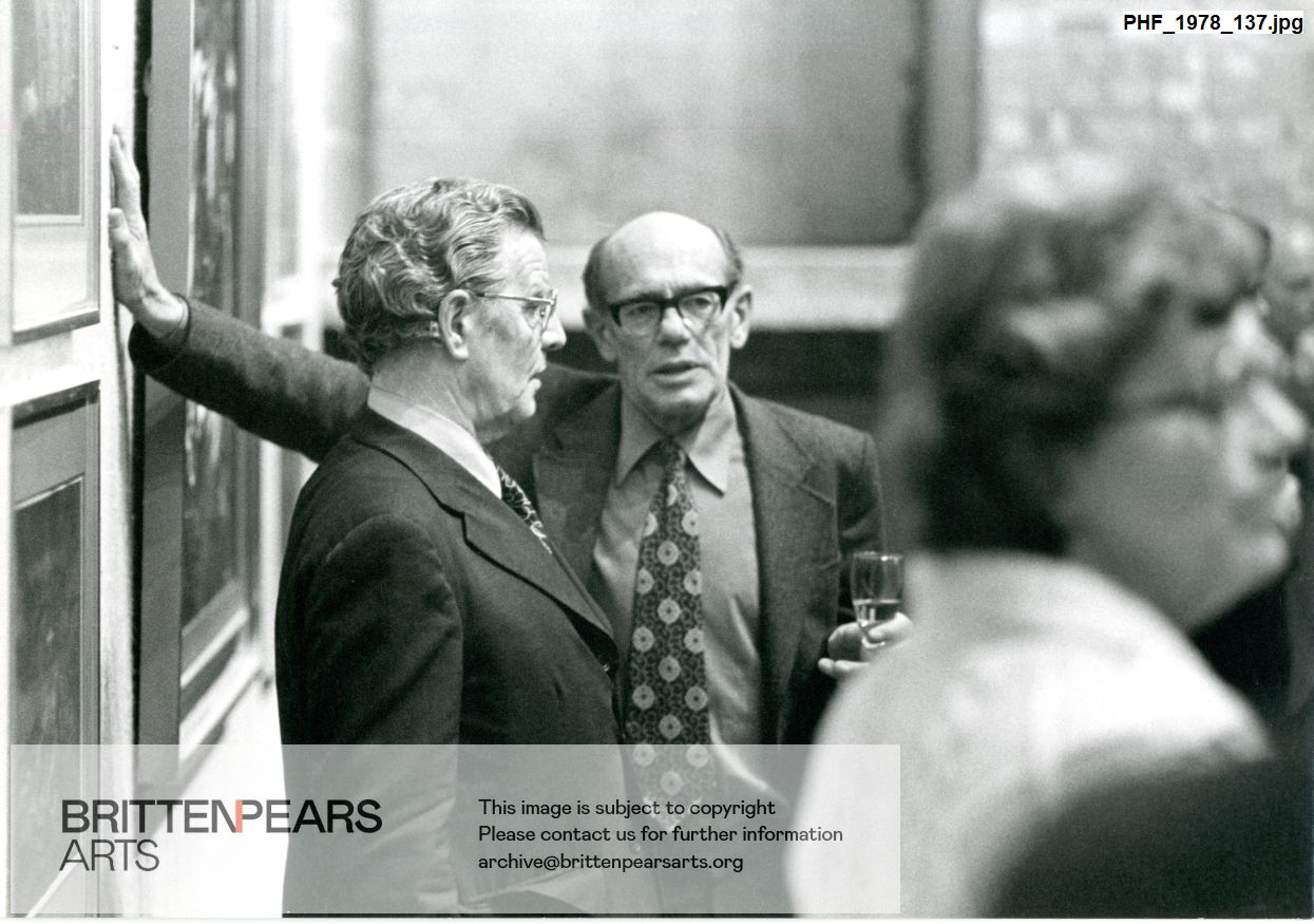 Photograph of Sir Eugene Melville and Cecil Aronowitz in conversation