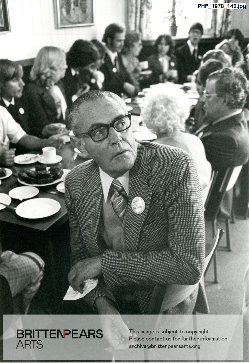 Photograph of Peter Racine Fricker at a tea party