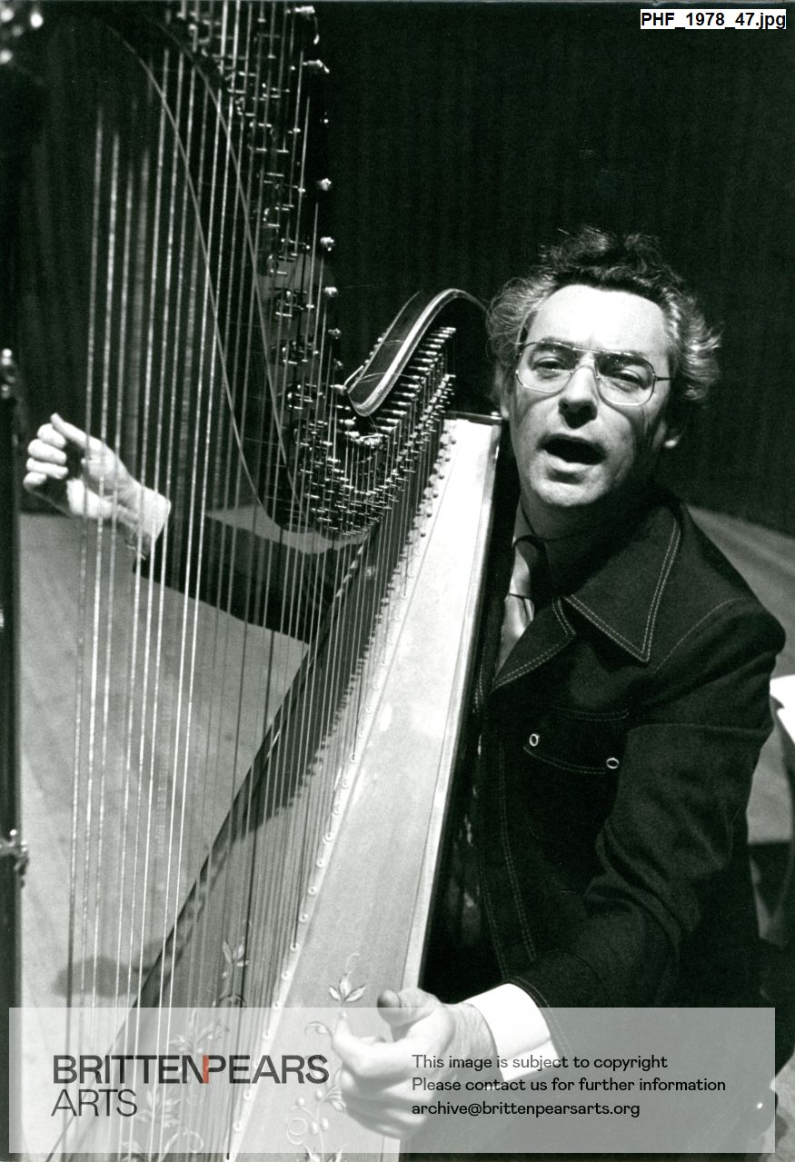Photograph of Osian Ellis playing his harp