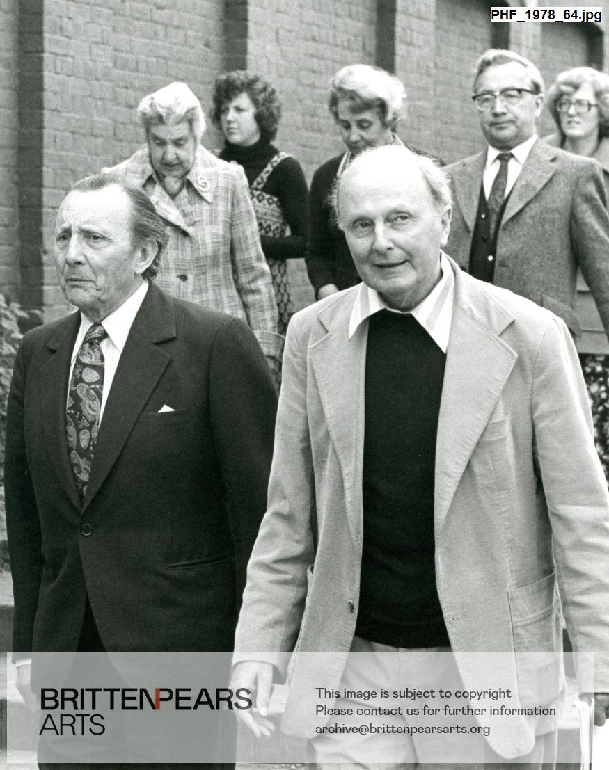 Photograph of Lennox Berkeley, Desmond Shawe-Taylor, Mr and Mrs Young and Jenni Vaulkhard walking down steps at Snape Maltings Concert Hall