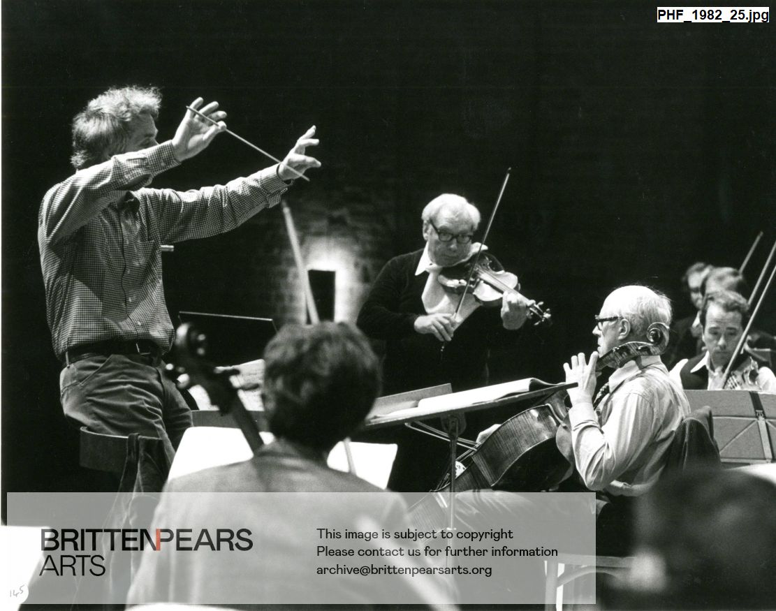 Photograph of Steuart Bedford conducting a rehearsal with Isaac Stern, Mstislav Rostropovich and Jose Luis Garcia.