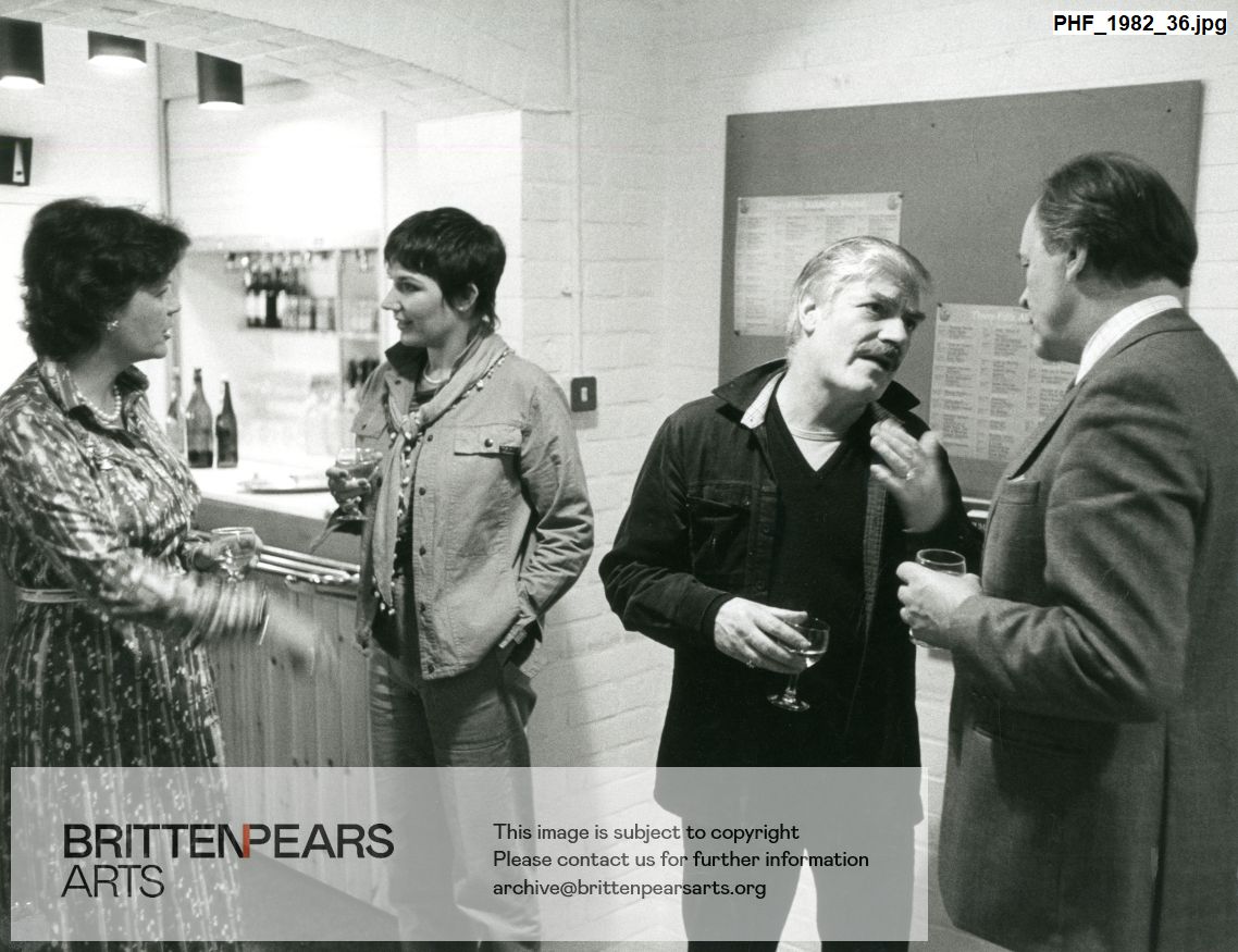 Photograph of Susan Fleetwood with three others backstage having a glass of wine