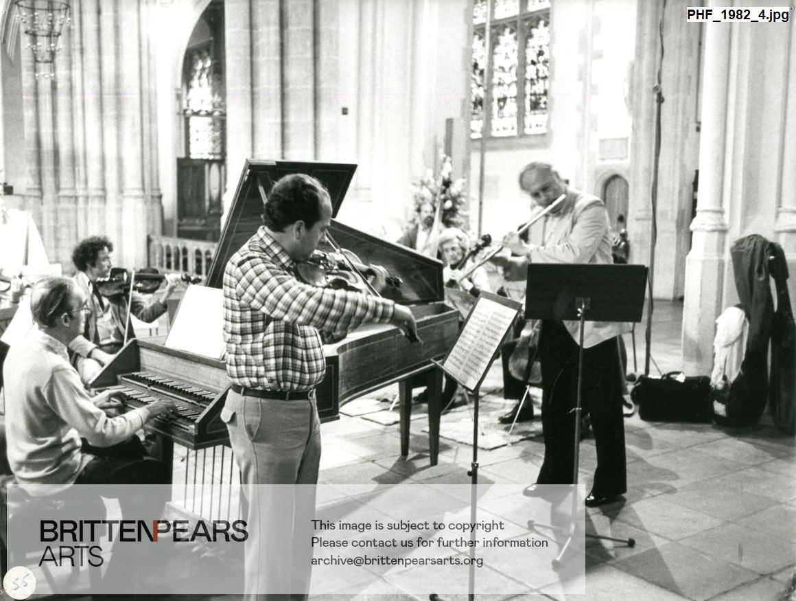 Photograph of George Malcolm at the harpsichord and violinist Jose Luis Garcia rehearsing in Bury St Edmunds Cathedral