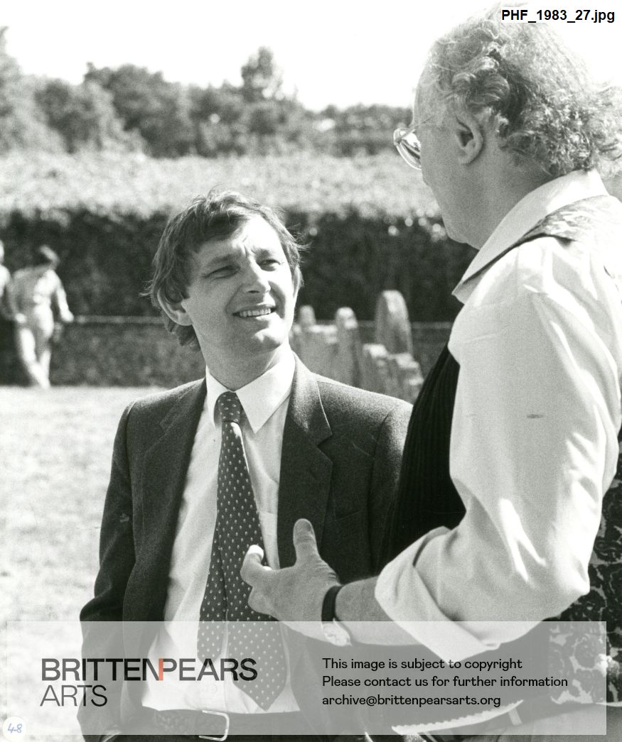 Photograph of an unidentified man and John Amis