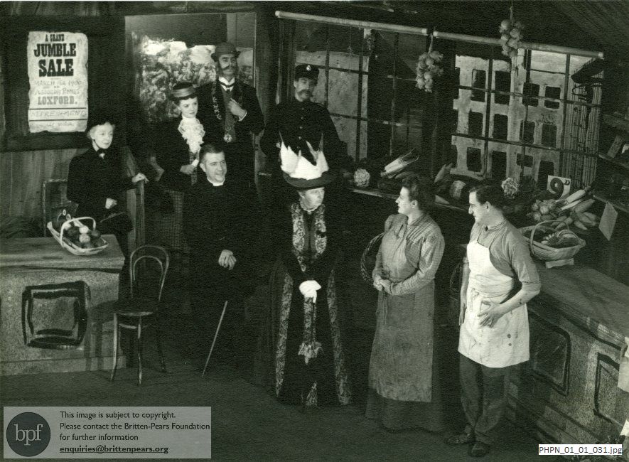 Production photograph of Britten's opera Albert Herring Act I scene 2  Mrs Herring's greengroceery