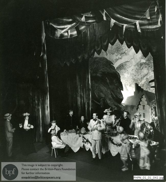 Production photograph of Britten's opera Albert Herring Act II scene 1 The Marquee