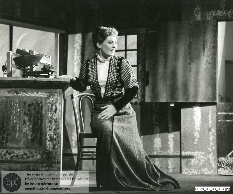 Production photograph of Britten's opera Albert Herring: Act III scene 1 Mrs Herring's greengrocery
