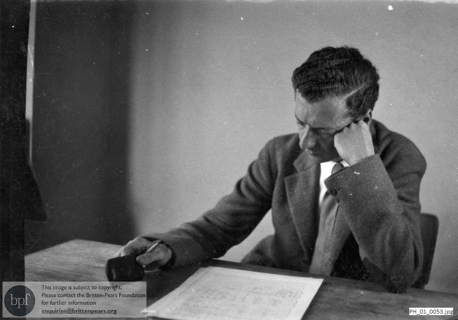Benjamin Britten working on a manuscript