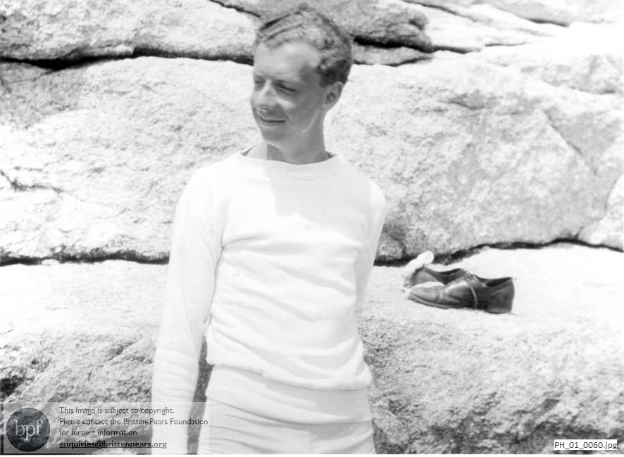Benjamin Britten in rocky landscape