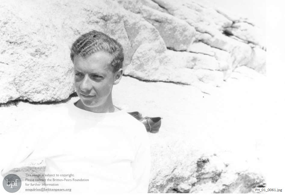 Benjamin Britten in rocky landscape