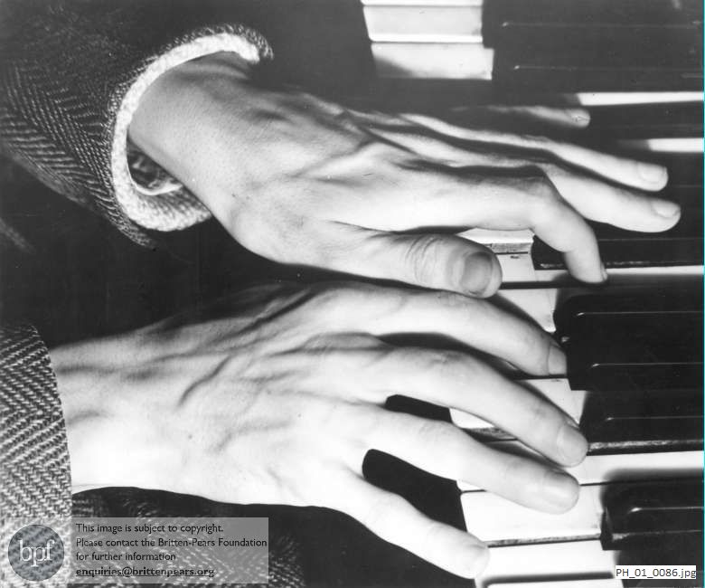 Benjamin Britten's hands on a keyboard