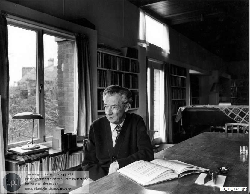 Benjamin Britten, professional portrait in the Library at the Red House, Aldeburgh