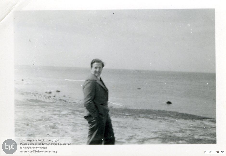Peter Pears on a beach in America
