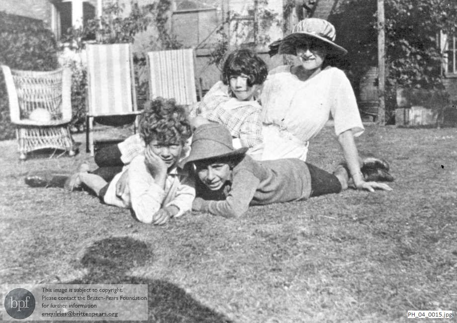 Benjamin Britten with friends in the garden