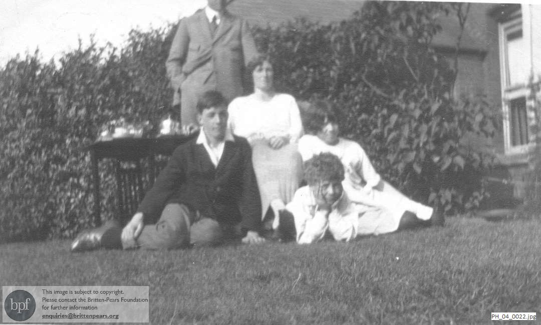 Britten family in the garden at home