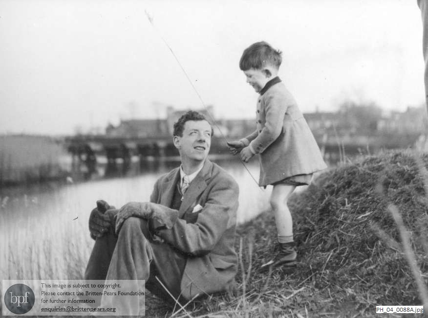 Benjamin Britten and his nephew on the river bank at Snape