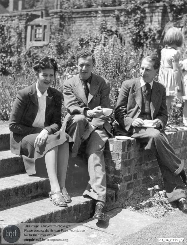 Benjamin Britten, Nancy Evans and Eric Crozier in the garden at Glyndebourne