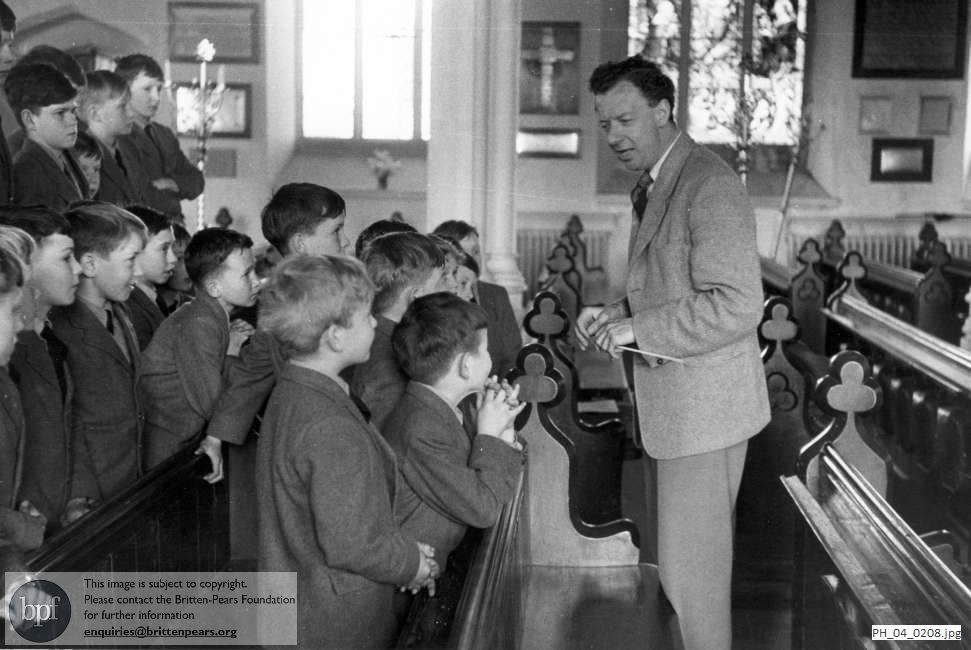 Benjamin Britten with Ipswich choir boys in Aldeburgh Church