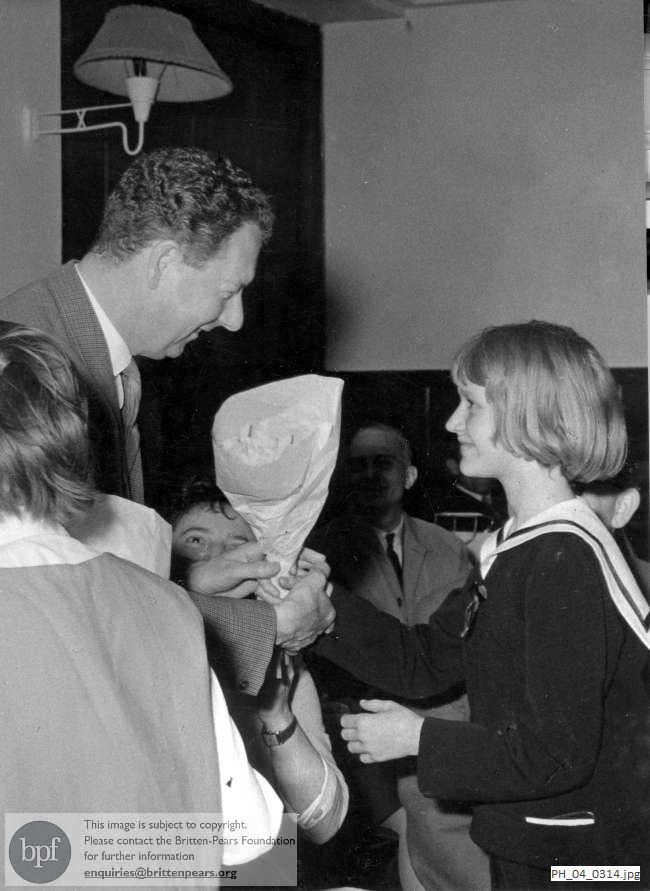 Benjamin Britten receives a bouquet in Budapest