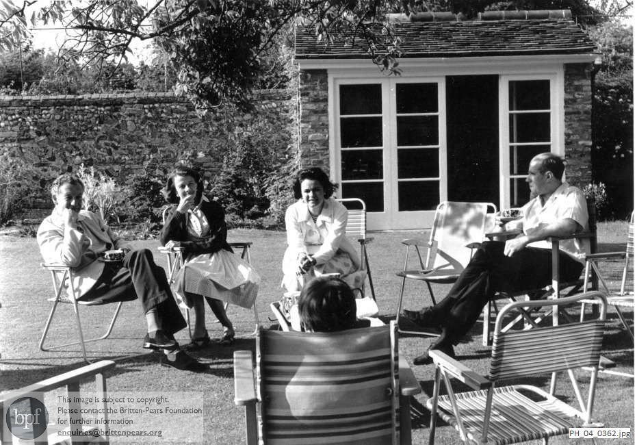 Benjamin Britten with friends in the Red House garden, Aldeburgh
