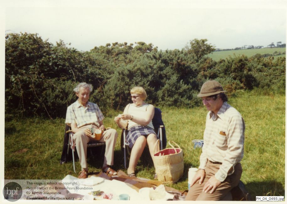 Benjamin Britten picnicking with Donald and Kathleen Mitchell at Friston, Sussex