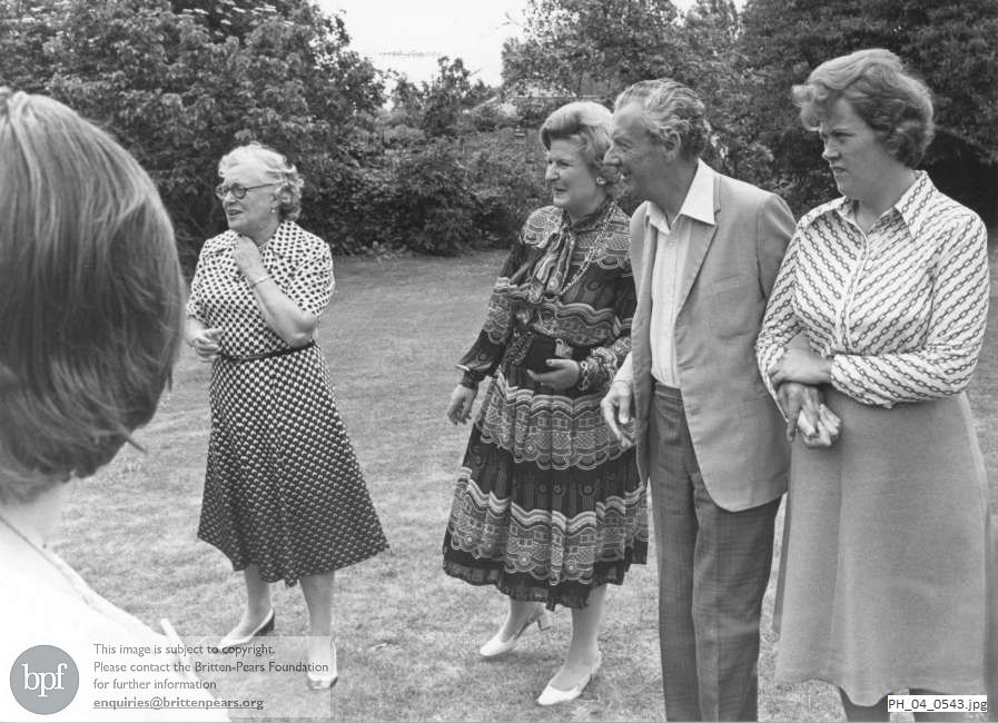 Benjamin Britten at a party given in the Red House garden for the Hesse students