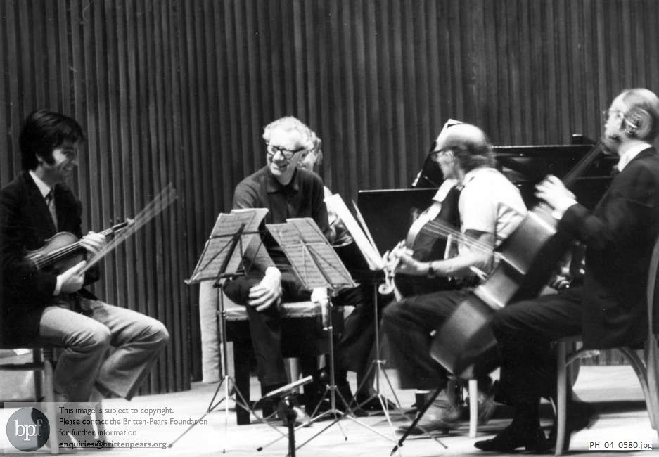 Benjamin Britten rehearsing on the stage of Snape Maltings Concert Hall, Suffolk