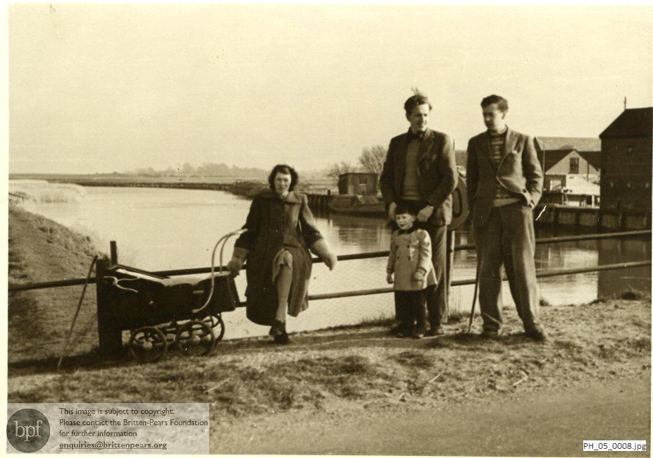 Benjamin Britten and Peter Pears with Beth Welford and her children on Snape Bridge, Suffolk