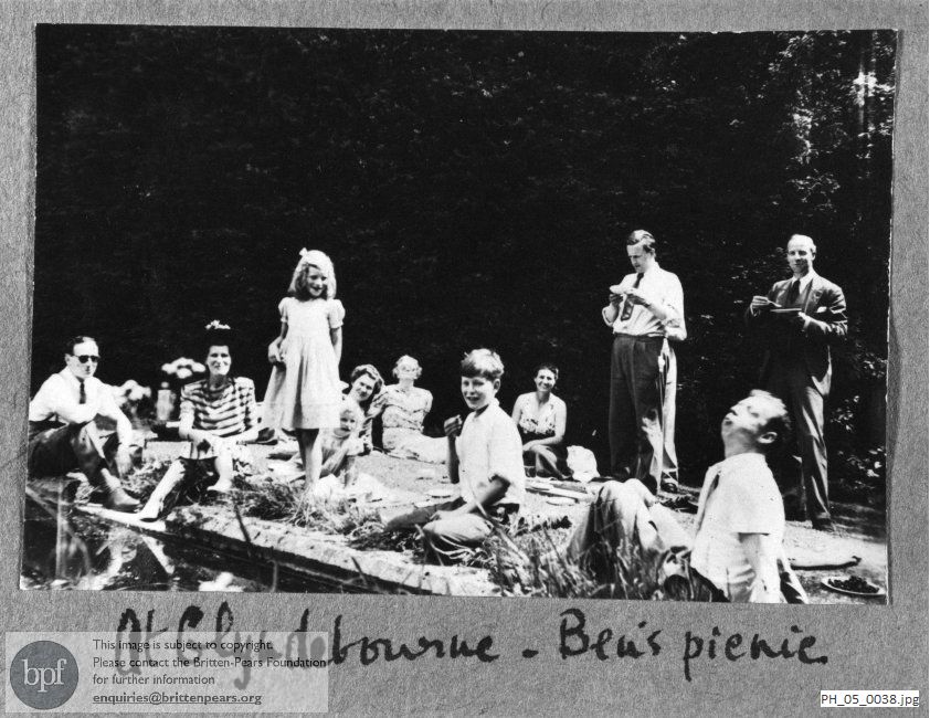Benjamin Britten and Peter Pears on a picnic with the Maud family at Glyndebourne