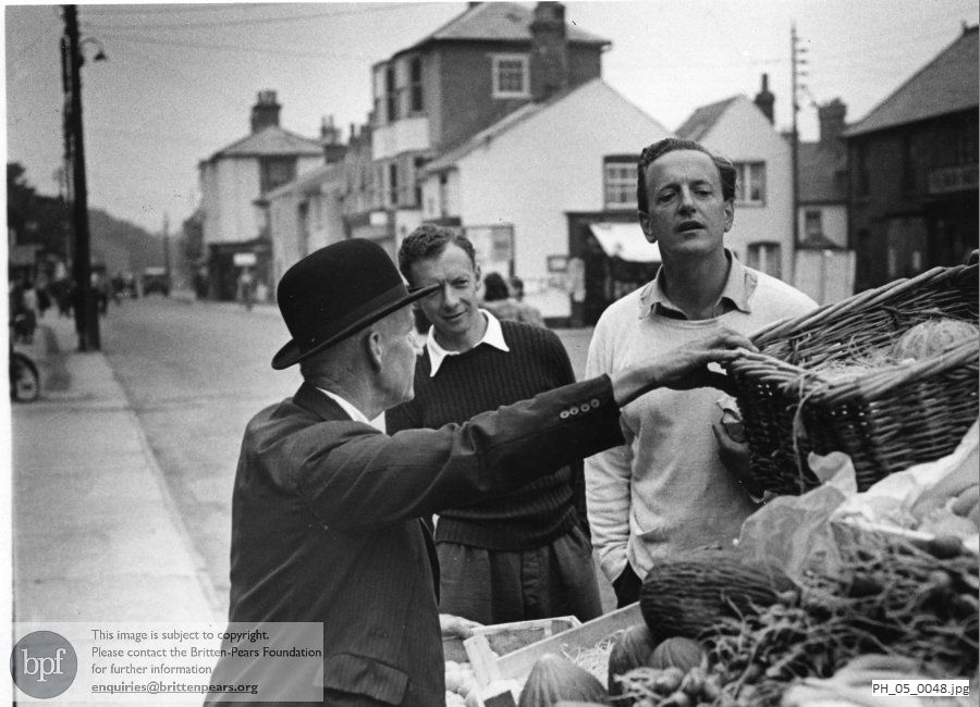 Benjamin Britten and Peter Pears with the greengrocer Jonah Baggott on Aldeburgh High Street