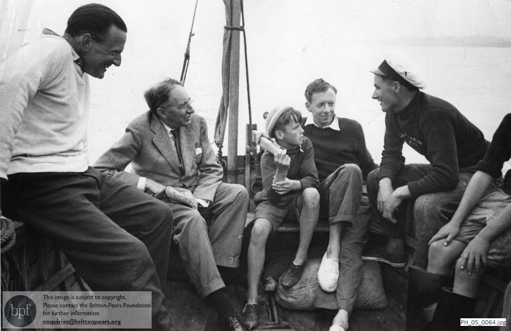 Benjamin Britten and Peter Pears with E.M. Forster and Billy Burrell in a fishing boat