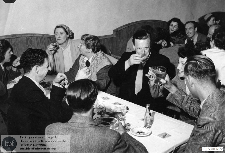 Benjamin Britten and Peter Pears with English Opera Group members at Bols factory in Amsterdam 
