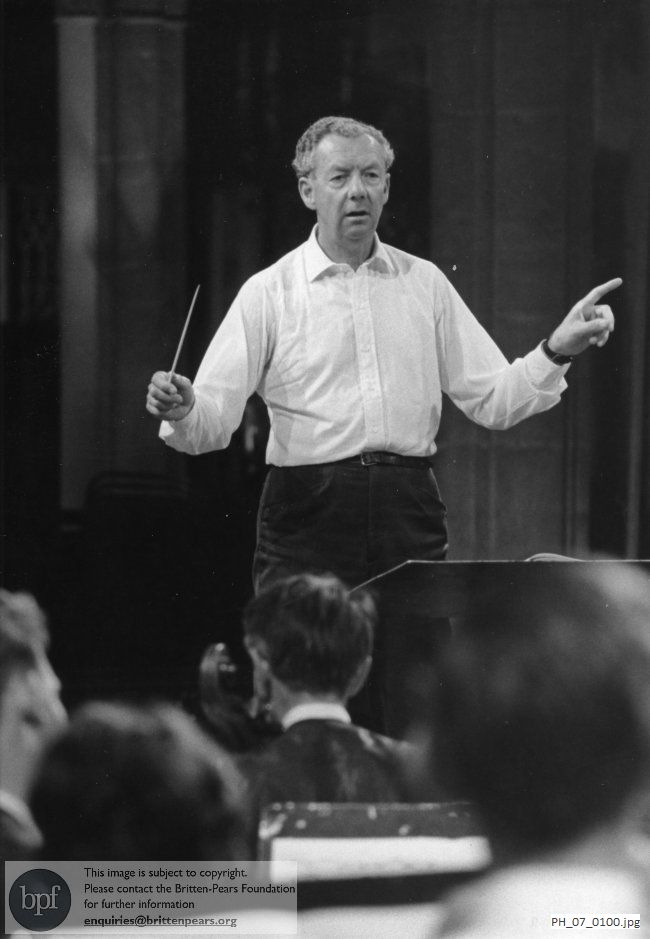 Benjamin Britten rehearsing in the Church of the Holy Trinity, Long Melford